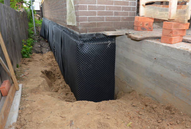 SJ Waterproofing Pros technician performing targeted Waterproofing assessment in Mohawk, TN